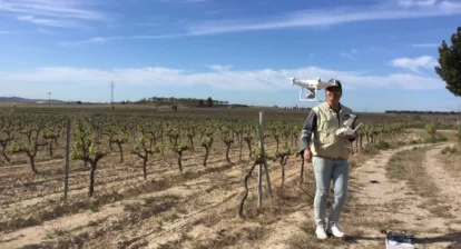 Agriculture regenerative experiment. Dr. Vladimir Baulin flying a drone in Catalonian vineyard. Photo taken on the 12th of April 2023